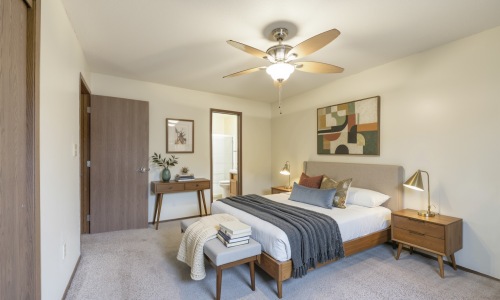 Bedroom with natural lighting and high ceilings