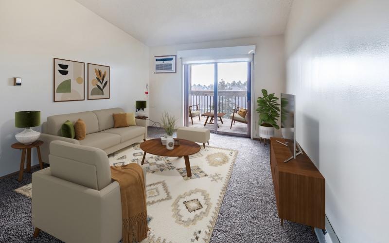 a living room with a large balcony